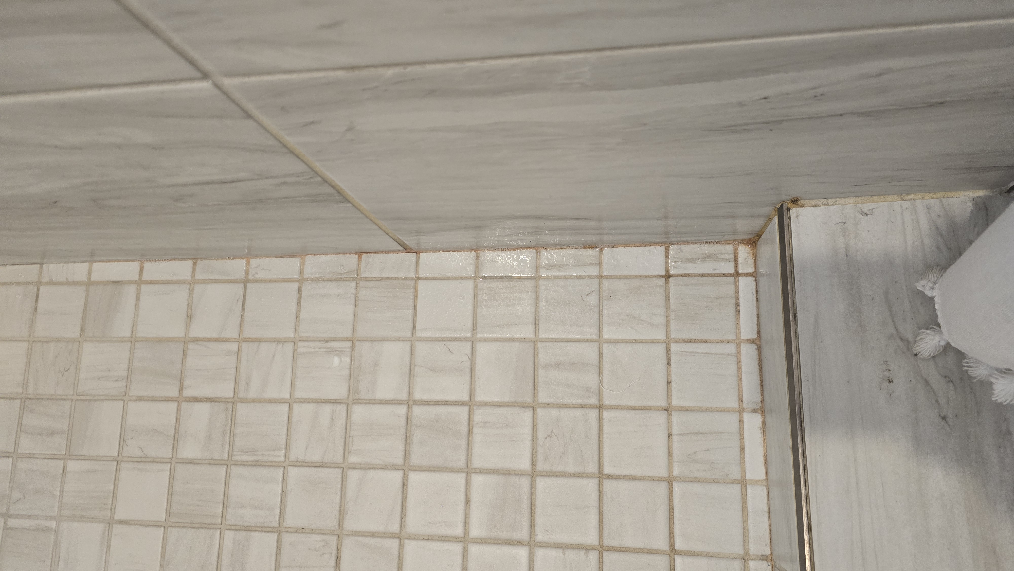 Shower floor corner after cleaning