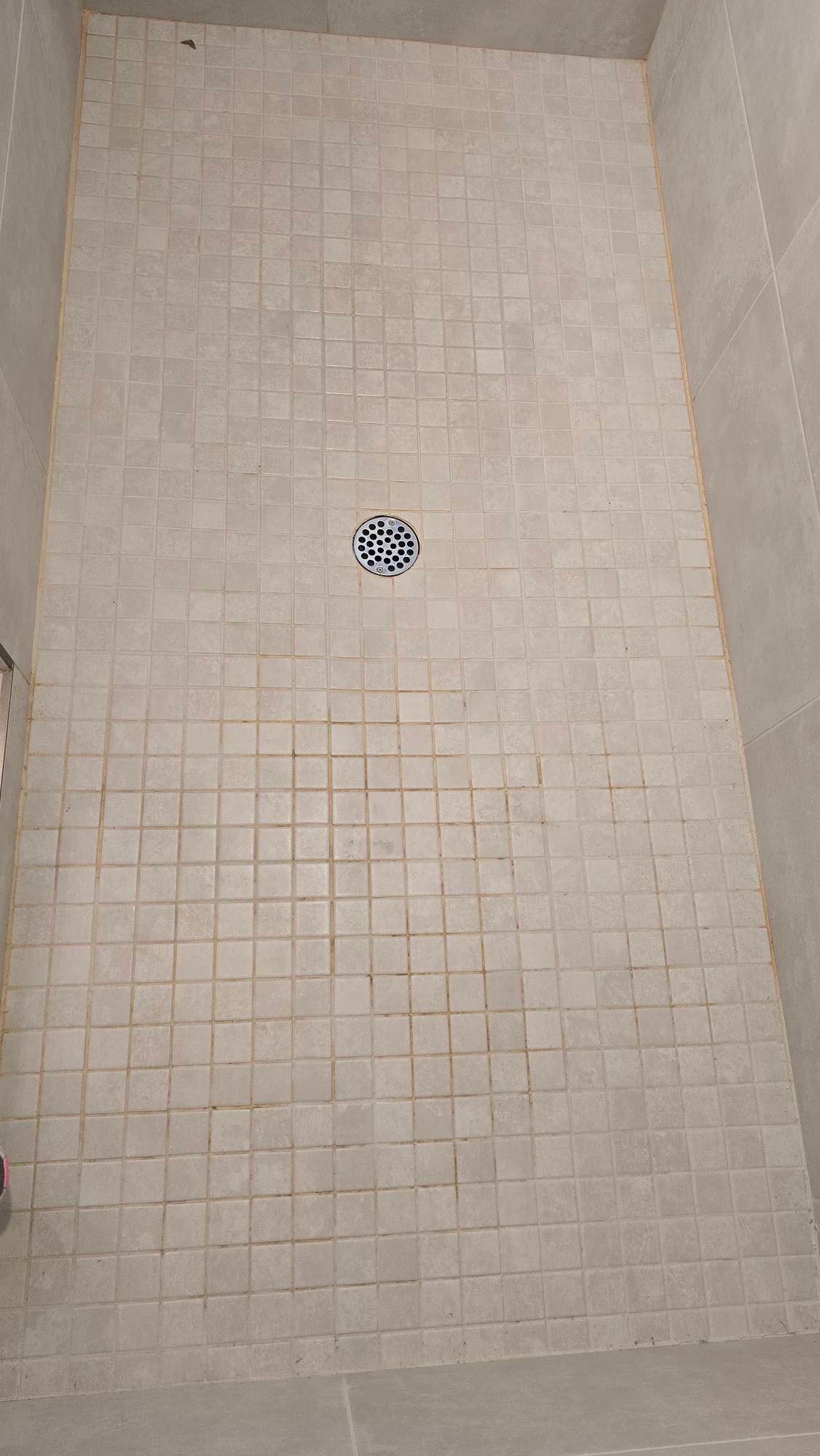 Shower tile before cleaning
